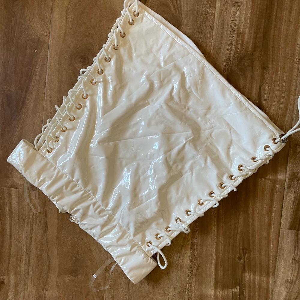 White latex skirt. Cutout sides